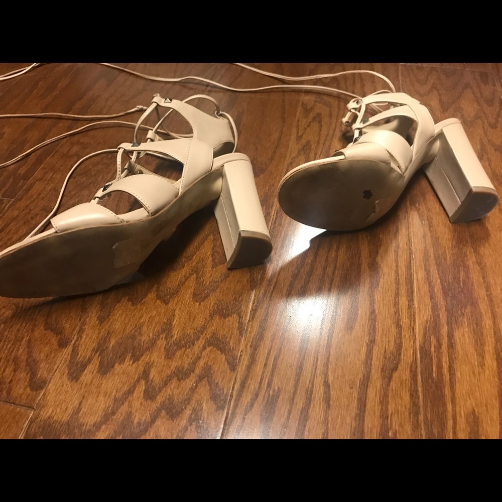 Worn once. Lace up